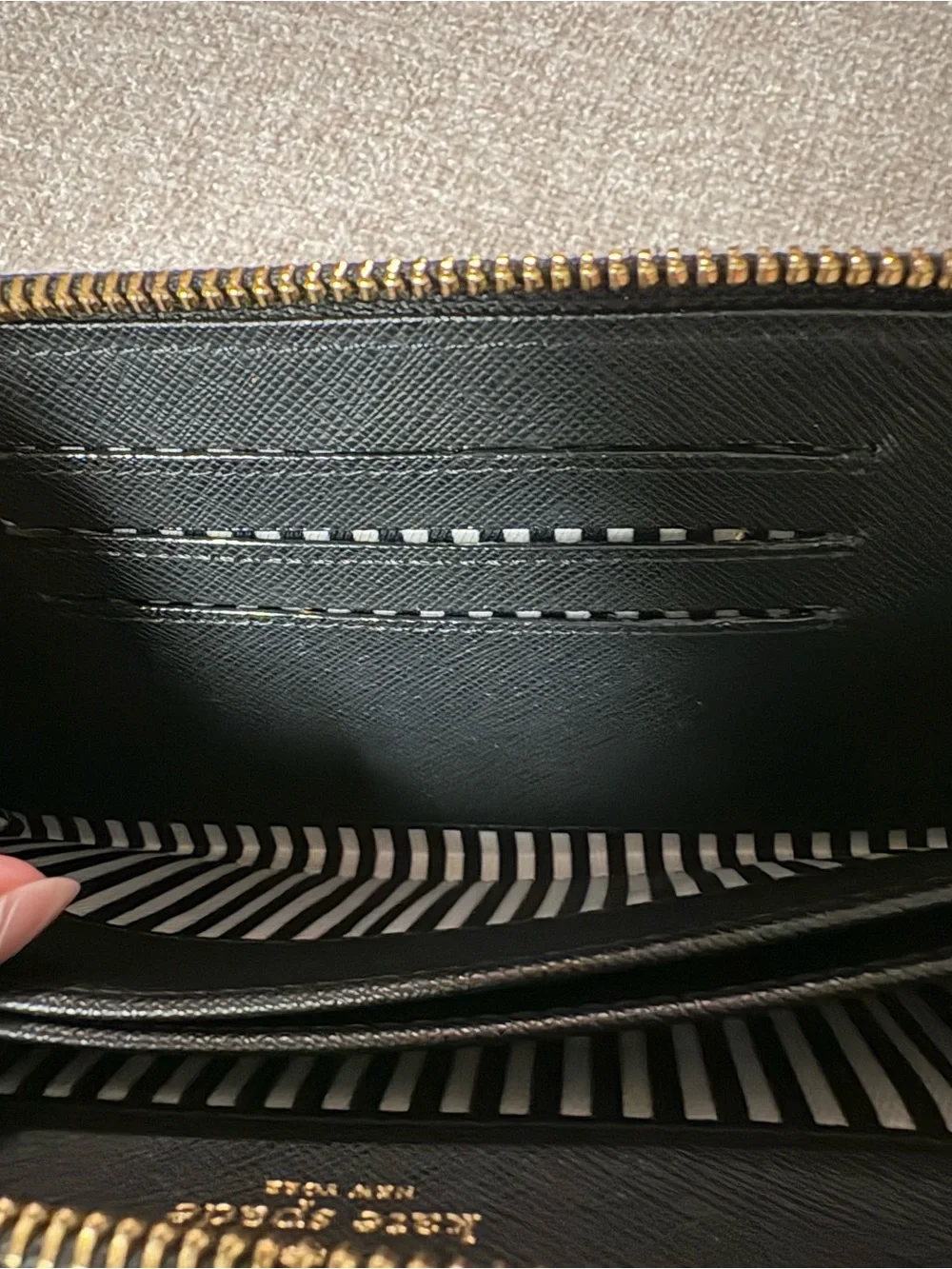 kate spade Black Zip-Around Wallet with Gold Logo